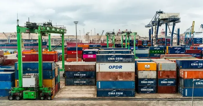containers and cranes at a dockside