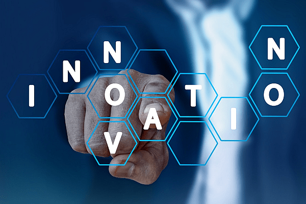 man pointing at innovation graphic